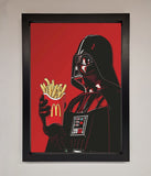 Framed artwork of Darth Vader holding a McDonald's fries container on a red background